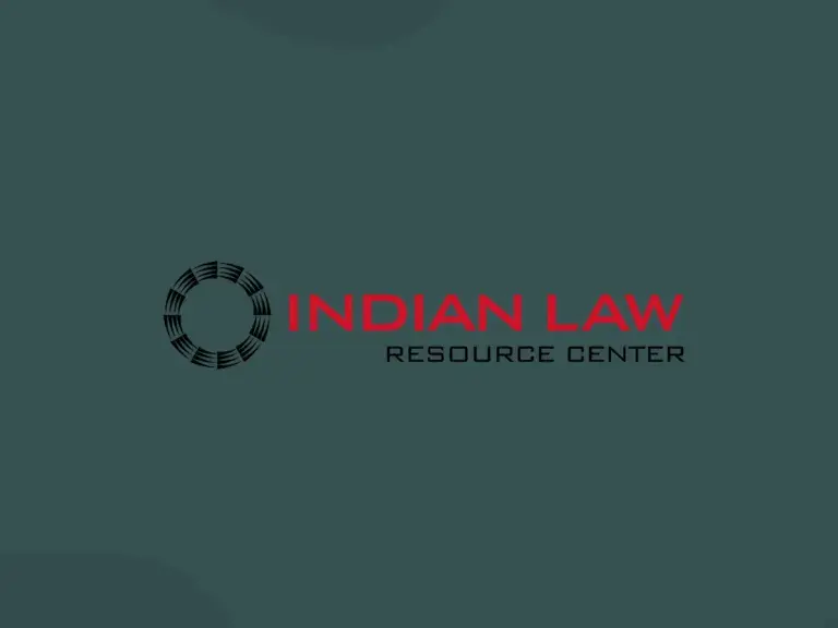 The photo shows the Indian Law Resource Center logo on a green background.