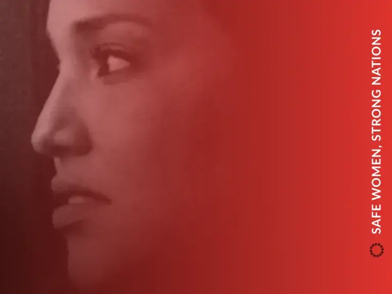 Image is a screenshot of a single women from an ILRC video.