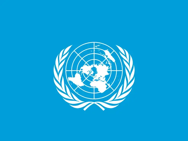 UN logo on a blue background.